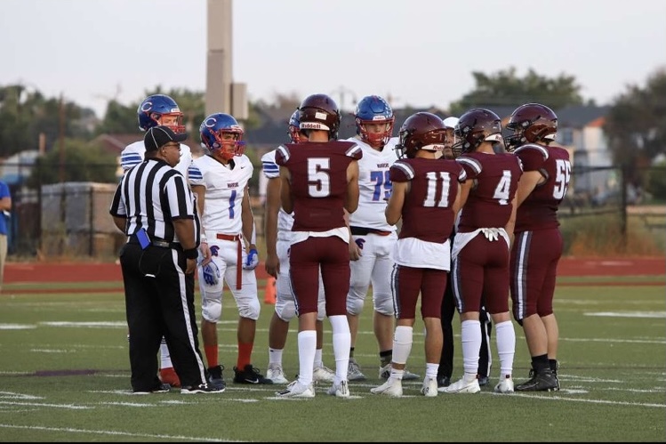 Coin toss between Silver Creek Raptors and Longmont Trojans before the rivarly game on September 23, 2021 at Every Montgomery field. Rivalry schools Longmont and Silver Creek went head to head in football once more.