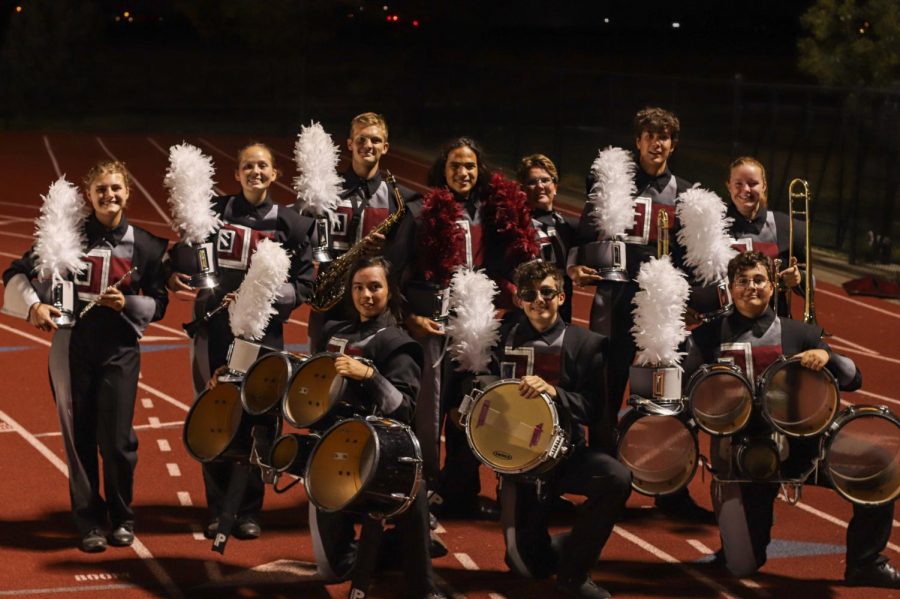 Silver+Creek+Marching+Band+Seniors+pose+for+a+photo+after+their+last+show.+Pictured+from+top+left+to+right%3A+Vera+Schmutz%2C+Madeline+Legg%2C+Connor+Springsteen%2C+Andrew+Patil%2C+Shenandoah+Waugh%2C+Gabriel+Harrison%2C+Julianne+Johnson%2C+Kyle+Watanabe%2C+Sean+Webb%2C+Jackson+Smith.
