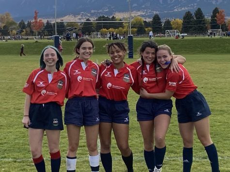 Girls rugby takes a team picture after a Saturday tournament at the Loveland Sports Park last year. Seniors, Amaya Rose, Libby Burton, Lilia Alizadeh, and Amber Shetter all want to remember this team and how close they have gotten.