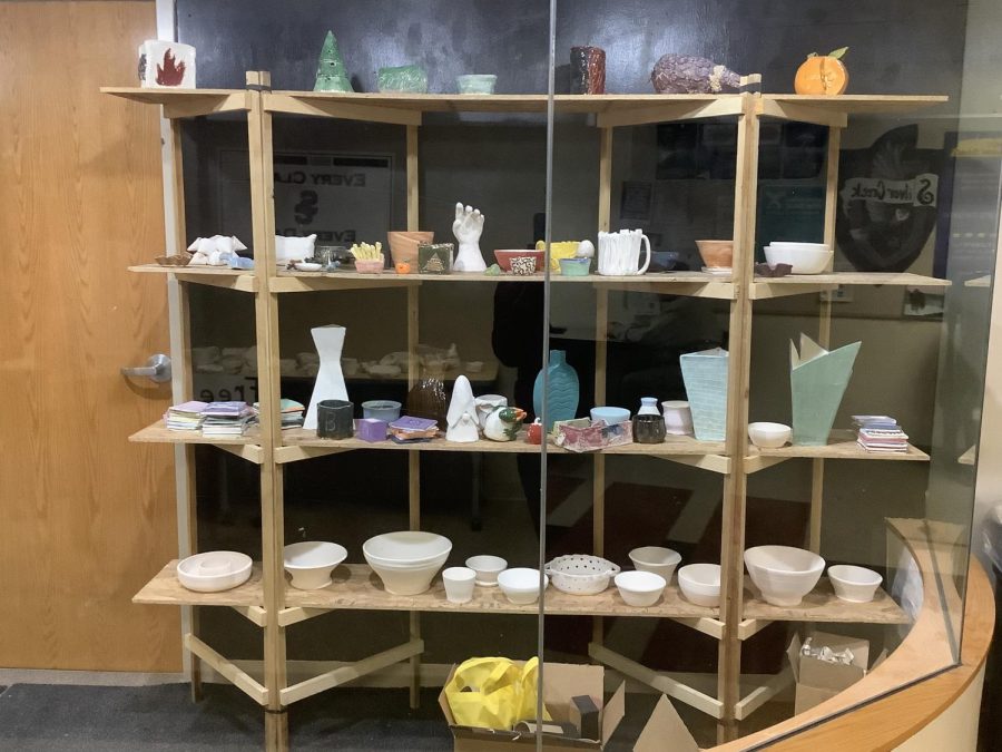 The+pottery+works+on+display+are+a+beautiful+way+for+students+to+share+their+work.+This+display+is+located+in+C-Wing.