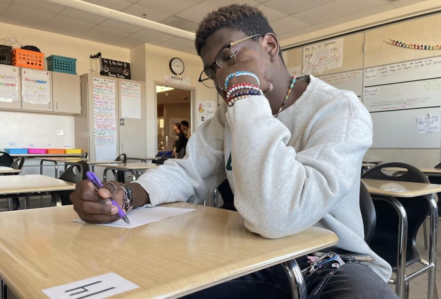 Students would often come into class on asynchronous Fridays to get work done such as tests. Malik Roth represents a student taking a test.