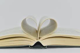 pages in a book folded into a heart.