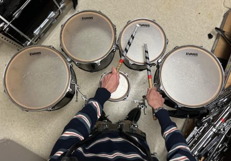 Silver Creek student Carter Martin shows off his skills. Martin played the tenor drums during Longmont’s 2022 drumline show, “Back to Abnormal”.
