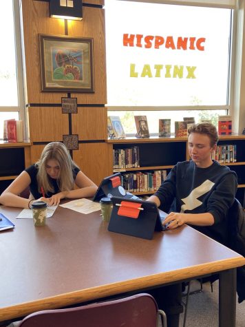Silver Creek students Patience Beebout and RC Bader are working hard after school during a tutoring session.