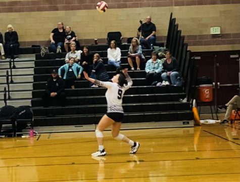 Junior Olivia Stratton serves during the 3rd quarter of the game against Greeley West. This game took place at Silver Creek High School for the last home game on Oct. 26, 2022. Stratton says, “I feel the final game went well, and I feel we had a great season.”