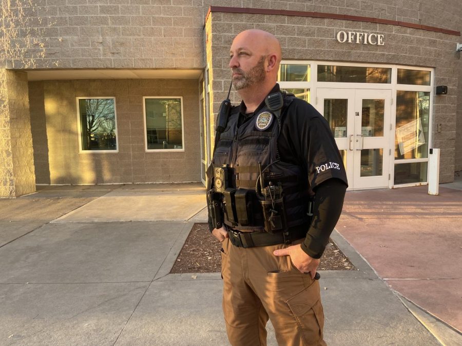 Just like every morning at Silver Creek High School the new SRO, Officer Bonday, is welcoming the students as they enter the school. This photo shows Officer Bonday waiting to greet and welcome every student, for their last Monday before Winter Break.