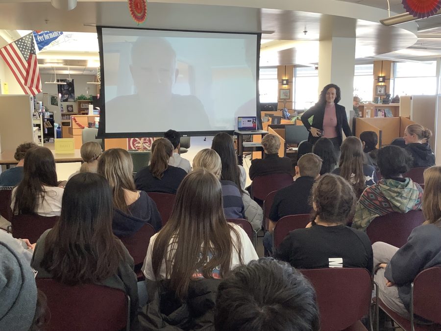 Students from Ms. Dame and Mr. Nixon’s 9th and 10th-grade classes participating in the meeting with Manny Gurowski, a Holocaust survivor.