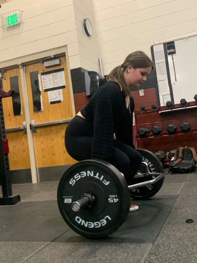 Hailey+Donahue+is+deadlifting+in+the+Silver+Creek+weight+room%2C+where+iron+works+and+weight+room+are+held.