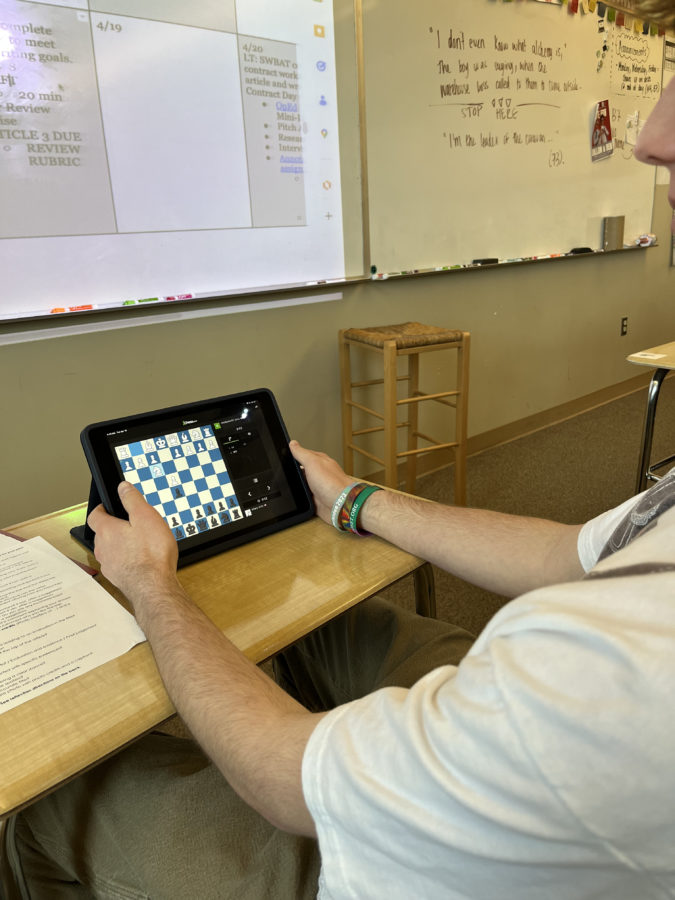 Silver Creek High School student and chess player Ben Hrubesky starts a game on the Chess.com app during his class on April 18th 2023.
