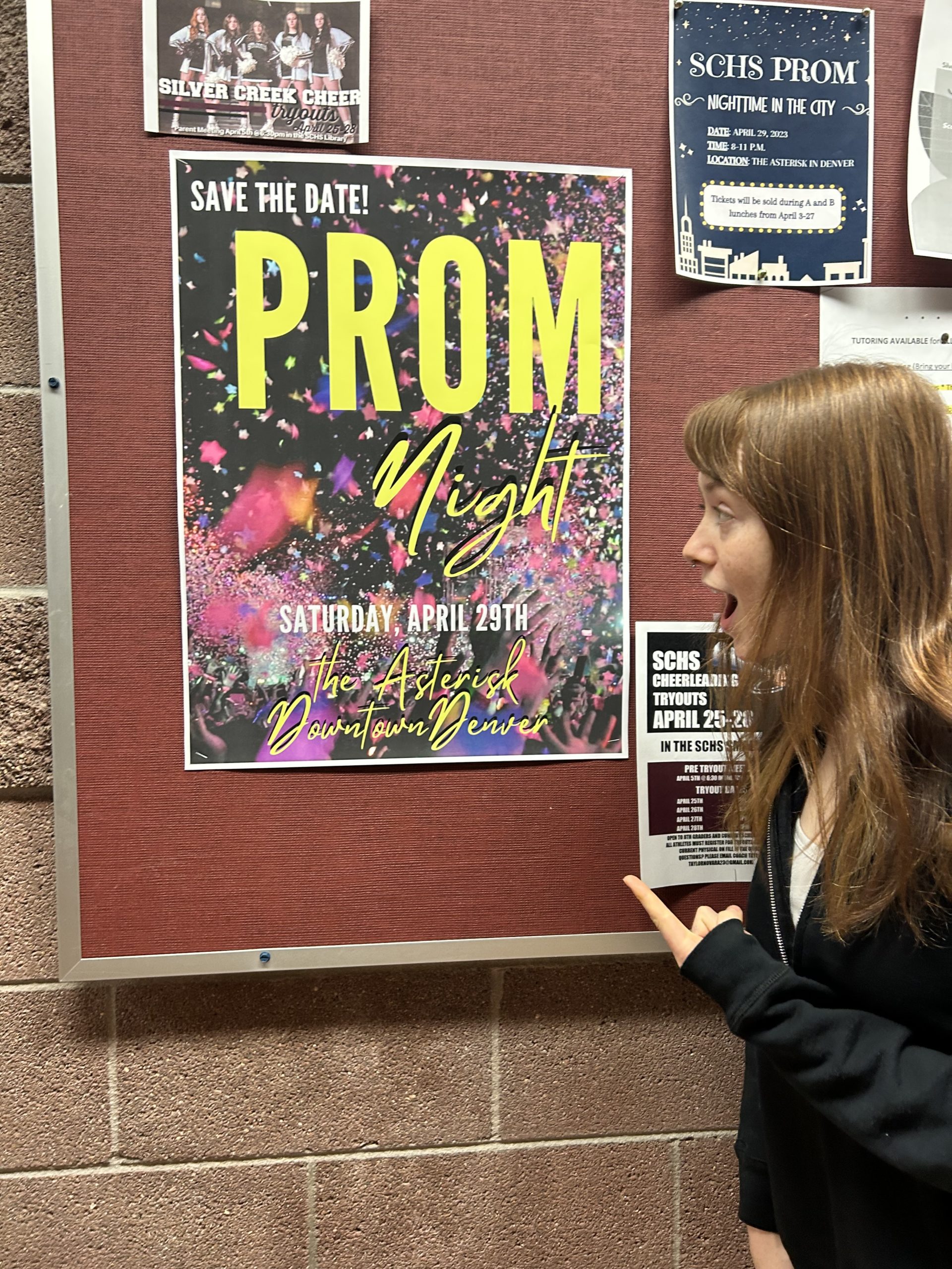 Senior, Lena Byrne reads the prom poster and gets excited for a magical night!