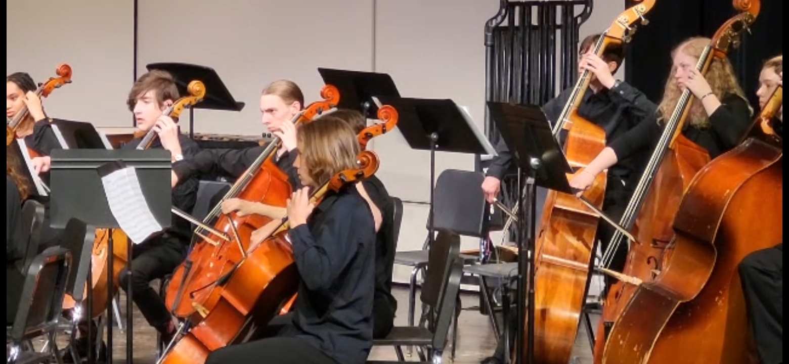 Caryana Sims, Jayme Potter, Jared Dettlebach, and Ryan Courtney all play cello, while Ryan Holden, Molly Ellis, and Bridget Dermondy play the stand up base in this years final orchestra concert