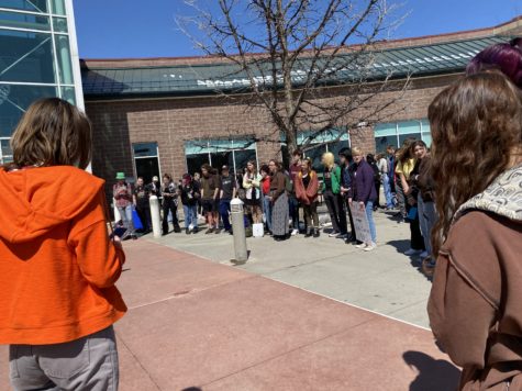 Students gather around on April 5th to stand against gun violence and share their stories.