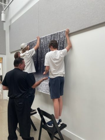 Before the prom dance on April 29, 2023, sophomore students helped set up decorations at The Asterisk venue with the help of teachers. From left to right: Nash Alber, Robert Nixon, Crue Tadje, and Cole Fritz.
