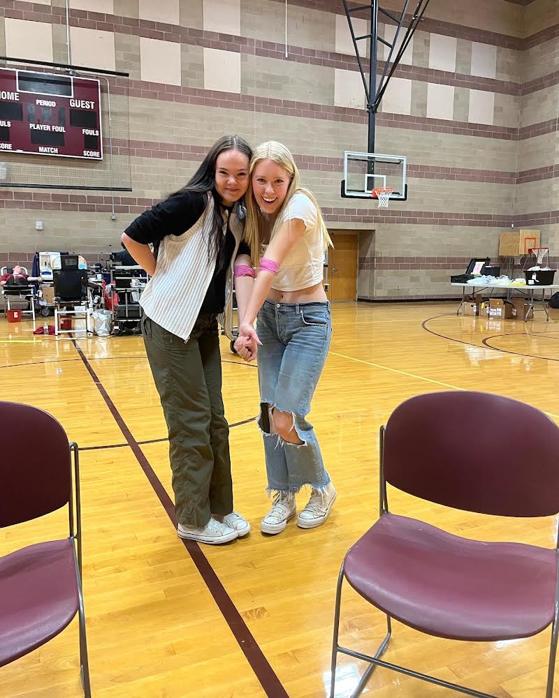 Silver Creek High School students pose for a quick picture showing off their bandages after donating blood. On October 19, Kaitlyn O’Connor’s capstone project Blood for the Better partnered with Vitalant to host a blood drive at Silver Creek. From left to right: Anaika Shaeffer and Kaitlyn O’Connor.
