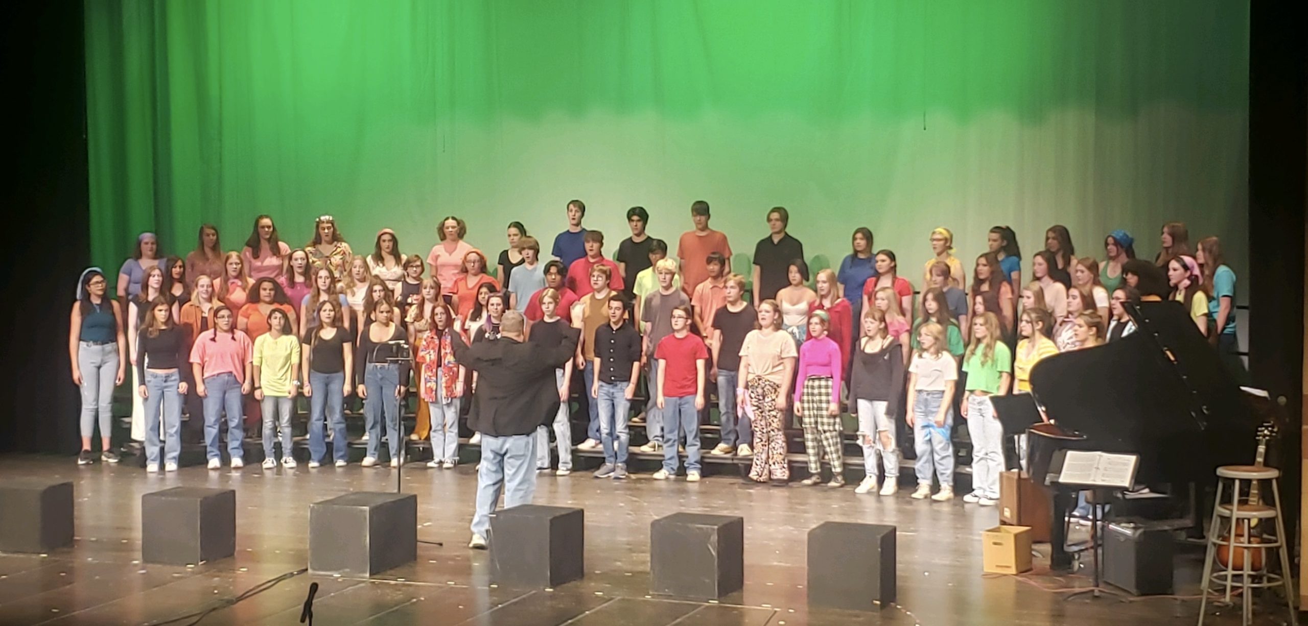 All of Silver Creek’s choirs (Bella Voce, Fella Broce [Tenor/Bass Choir], Treble Choir, and Concert Choir) end the Farewell Concert this past Wednesday by singing ‘Bridge Over Troubled Water’.