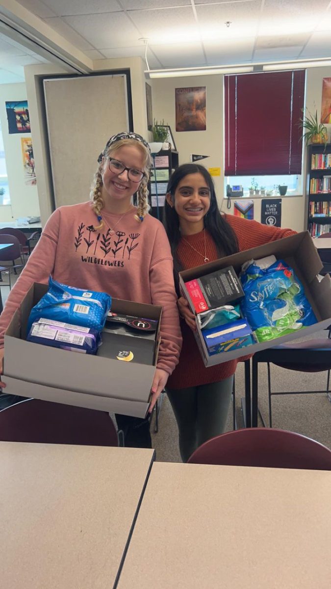 Rachel Dowlin and Muskan Dhillon with some of their collected donations so far this year!