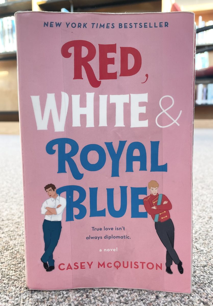 The novel version of the movie “Red White and Royal Blue by Casey McQuiston found in the Silver Creek library,