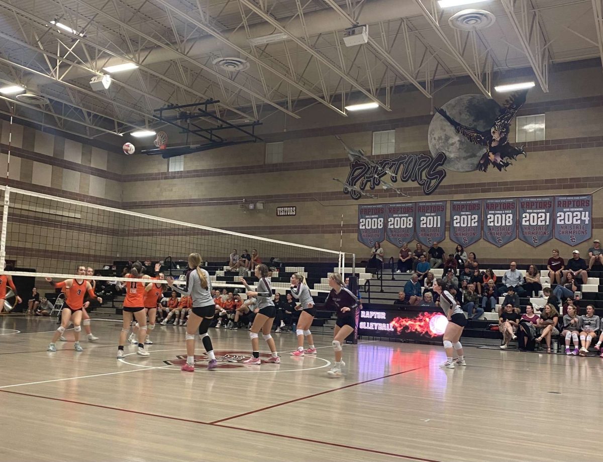 Silver Creek High School’s girls varsity volleyball team battles Erie High School on October 22, 2024. Even though Silver Creek faced a loss that night, the team found comfort and support within each other, their love for the game not wavering.