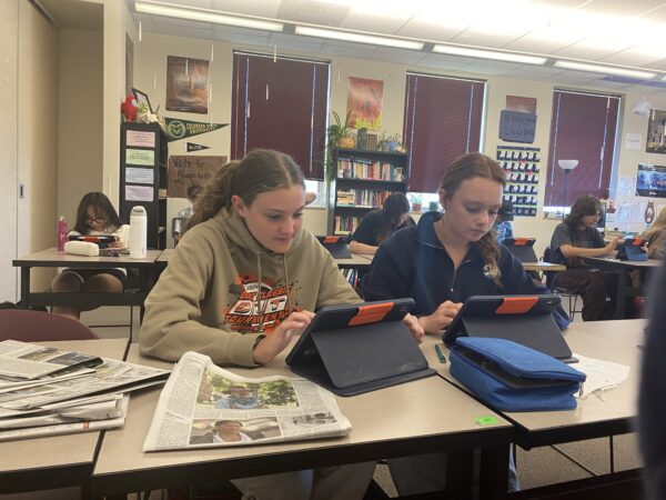 Daphne Moe and Eden Bond

Silver Creek High School students Daphne Moe(right) and Eden Bond(left) are hard at work in Journalism class on Tuesday, October 22.