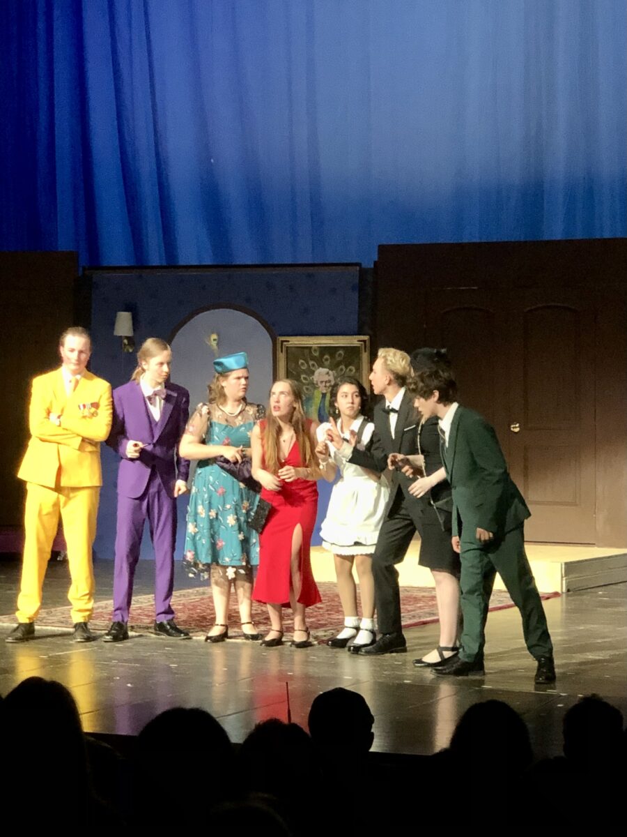 From left, Desmond Baker, Gavin Coffin, Allisan Heydt, Grace Ann Dunn, Lyla Capparelli, RC Bader, Liv Baker, and Dominic Beer performing in the most recent Silver Creek Production, “CLUE: On Stage”.