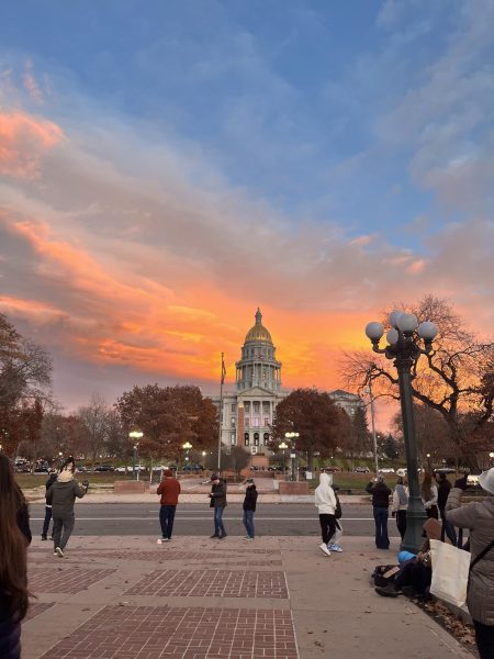 The Colorado State Capitol which is a notable landmark, especially during a breathtaking sunset. Following this experience, the exchange student visited a traditional German Christmas market, which is known for its festive atmosphere and unique cultural offerings.