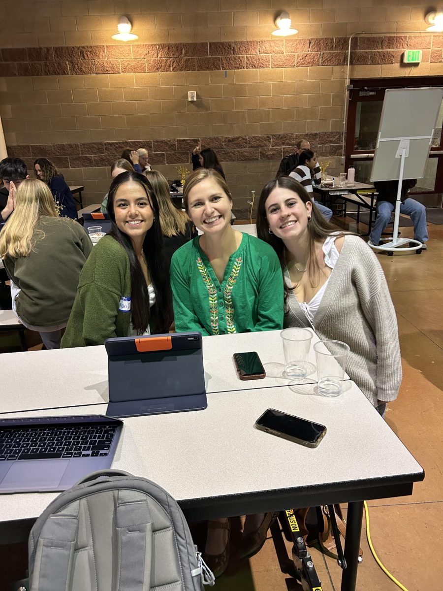 SCLA students Diamari Flores (left) and Lucia de La Lama (right) meet with their mentor, Rachel Turner (middle), on November 14th at the family-mentor dinner.