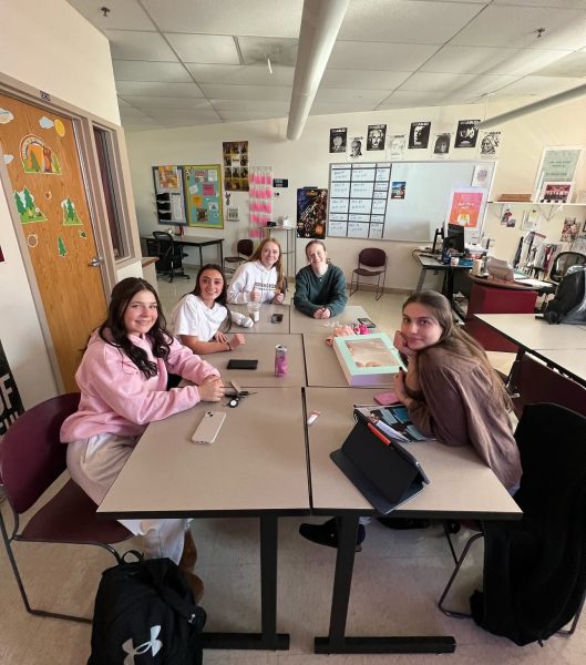 Members of the Unity with UNICEF (left to right) Phoebe Richmond, Josie Starks, Haley Lindberg, Paige Schleper, and Mannaz Ezzat meet during lunch. 

Photo courtesy of Haley Lindberg