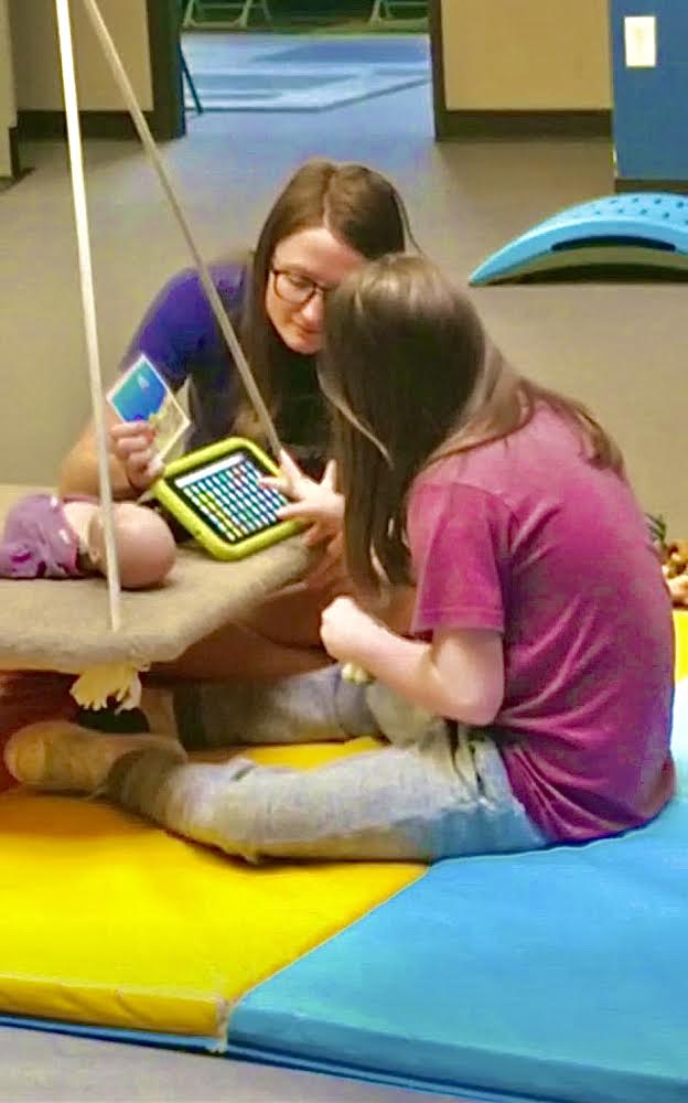 A St. Vrain Valley School District student receives occupational therapy out of school. The funding of these services are in jeopardy.
