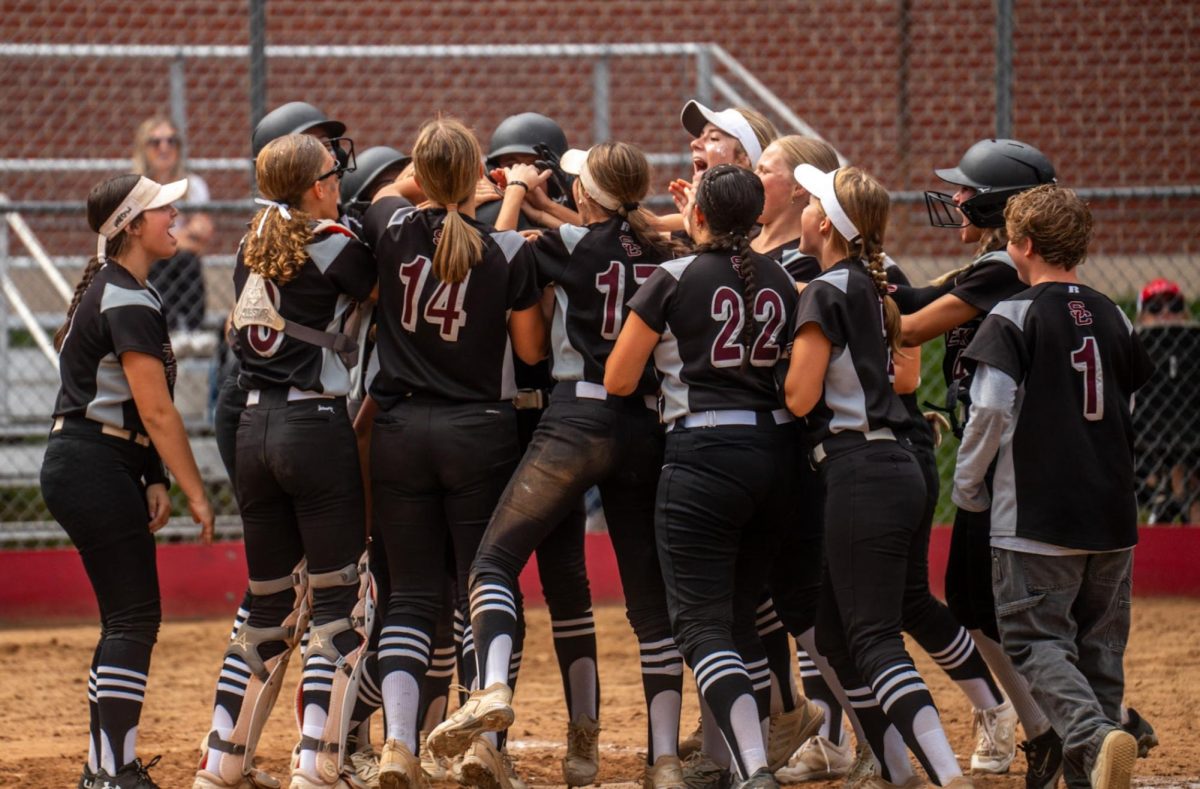 Varsity softball celebrates their win in the 2025 season. 