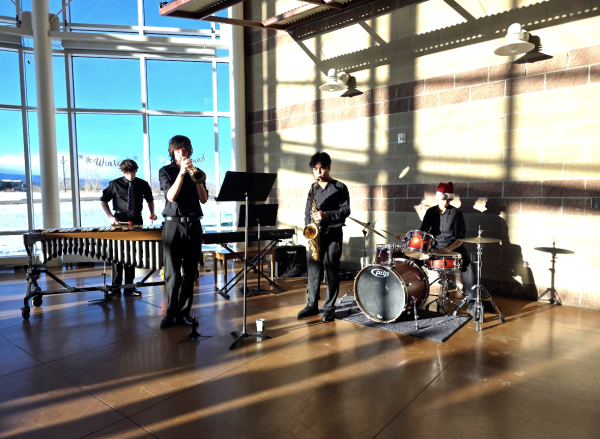 Silver Creek High School students playing in a jazz combo in the Silver Creek High School Commons on December 6th. Left to right: Leo Legault, Griffin Sims, Gavin Kim, Katelyn Brown.
