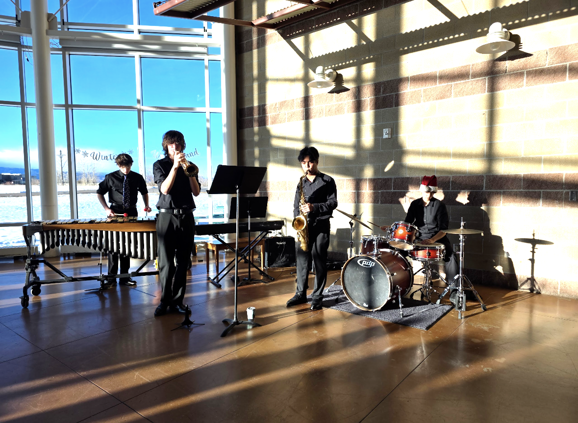 Silver Creek High School students playing in a jazz combo in the Silver Creek High School Commons on December 6th. Left to right: Leo Legault, Griffin Sims, Gavin Kim, Katelyn Brown.