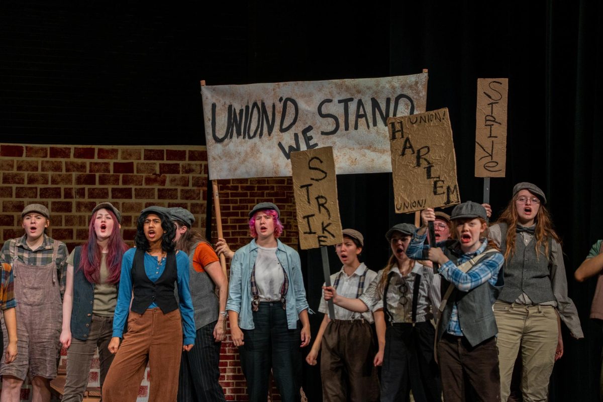 A moment from Silver Creek High School's performance “Newsies” when they are striking against the rising prices of the newspapers. From left to right: Ellie Vanderschaaf, Ollie McElroy, Anupriya Anil Mylevahanan, Mary Crook, Milo Capparelli, Brycee-Lynn Reynolds, Ella James, Magda Ingersoll, Lisbeth Cecil