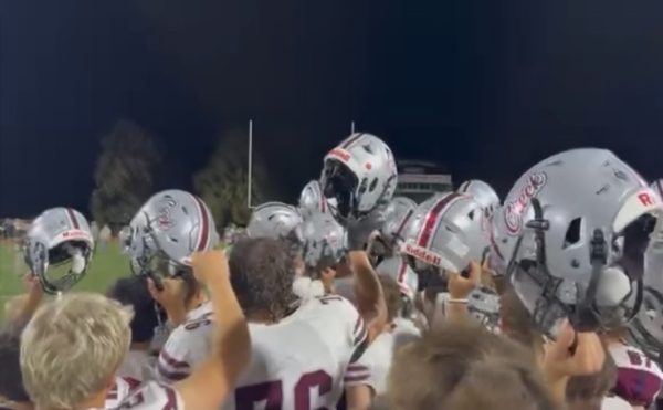 Silver Creek celebrates a 27-14 victory over Rival Longmont at Longmont High School in the fall of 2025. They hold their Riddell helmets up to celebrate the win, with next year’s helmets being new and improved.