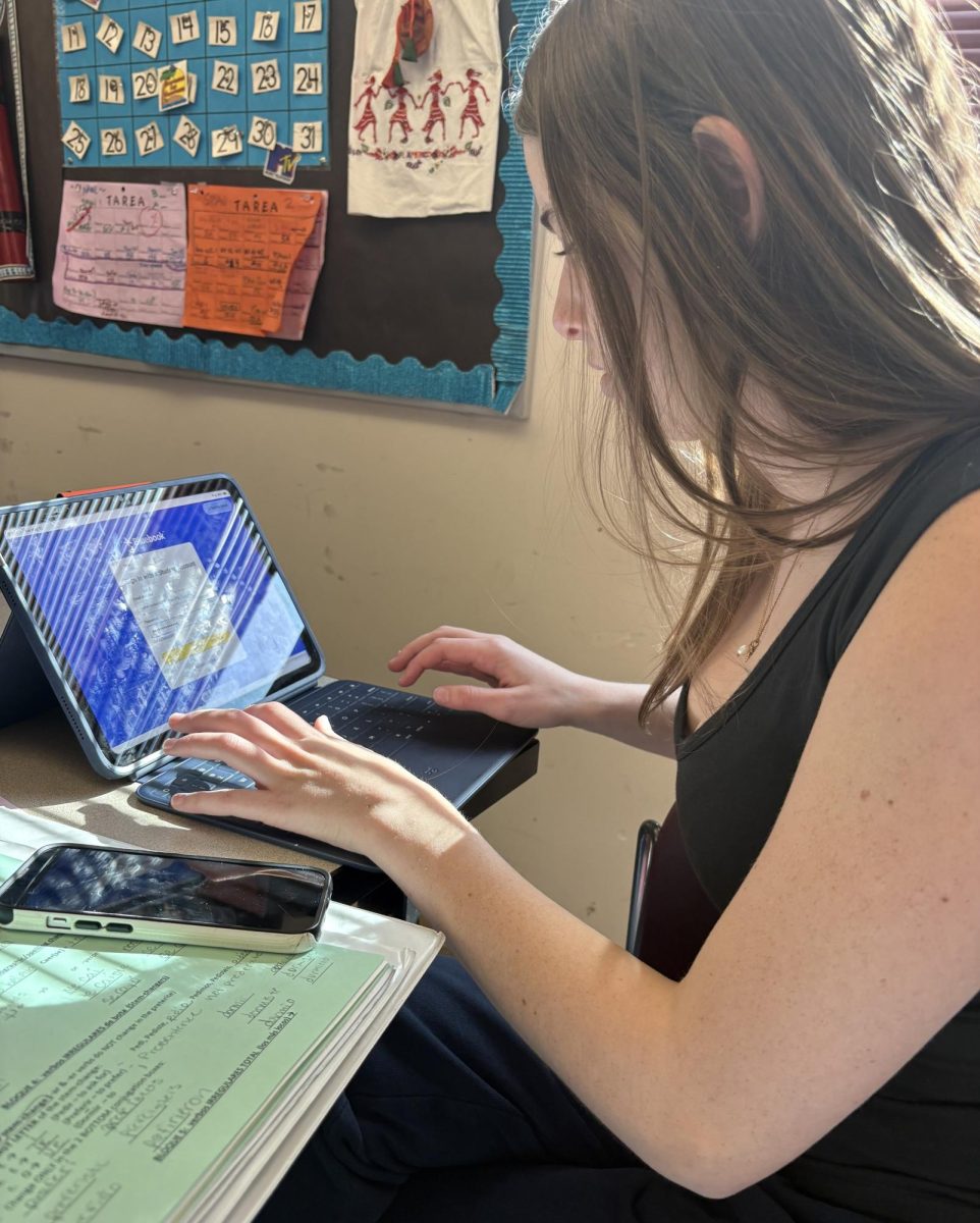 Junior, McKenzie Palles logging onto Bluebook to study for the SAT.