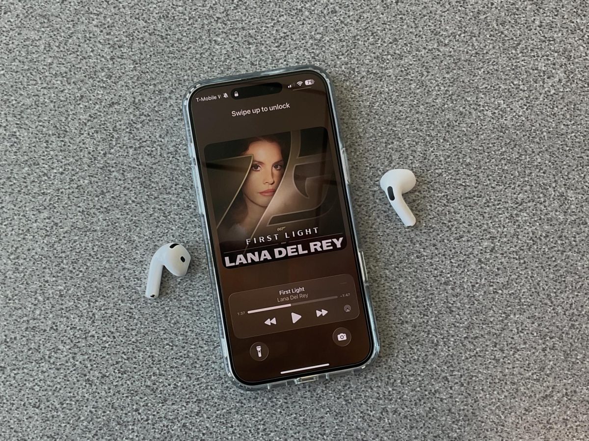 Listening to Lana Del Rey’s new single “First Light” on Spotify.