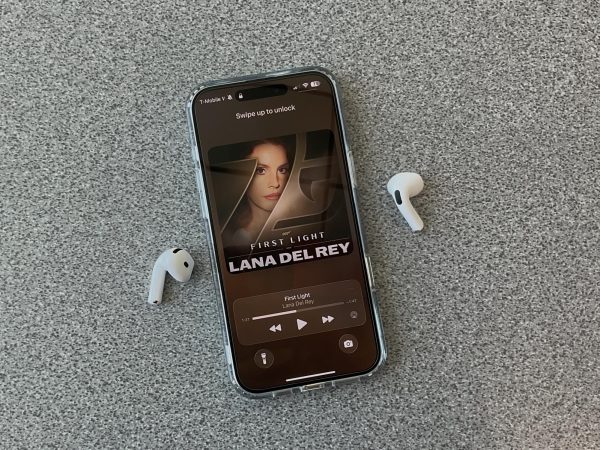 Listening to Lana Del Rey’s new single “First Light” on Spotify.